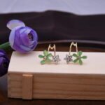 Green Petalled Star Stone Huggies Earrings